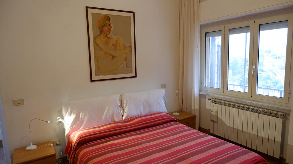 ferienhaus la cantoniera schlafzimmer mit grossem doppelbett