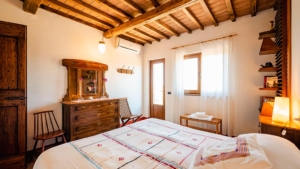 ferienhaus poggio di luca alleinlage ausblick pool gemuetliches schlafzimmer