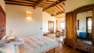 ferienhaus poggio di luca alleinlage ausblick pool schlafzimmer mit sitzecke
