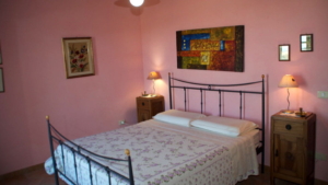 Ferienwohnung Cantinaccia Rosa Schlafzimmer