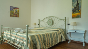 villa san gimignano toskana schlafzimmer collemuccioli